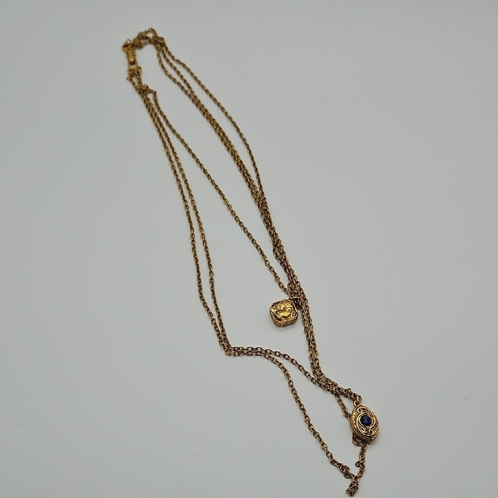 Elegant Gold Necklace with Navy Details